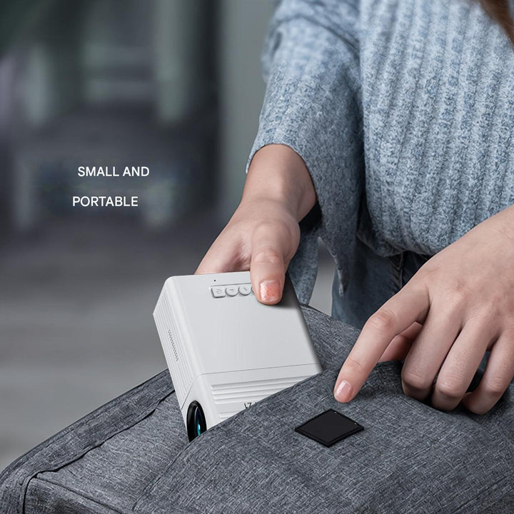"Compact portable mini projector with 3000 lumens, ideal for vibrant indoor and outdoor cinema experiences, features USB, HDM
