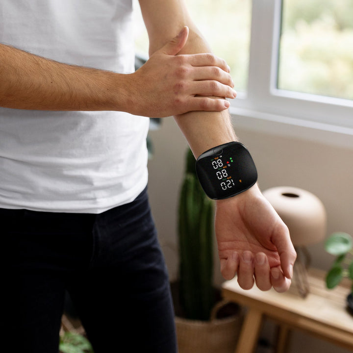 Compact smart wrist blood pressure monitor with a large LCD, sleek design, precise readings, ideal for health tracking.
