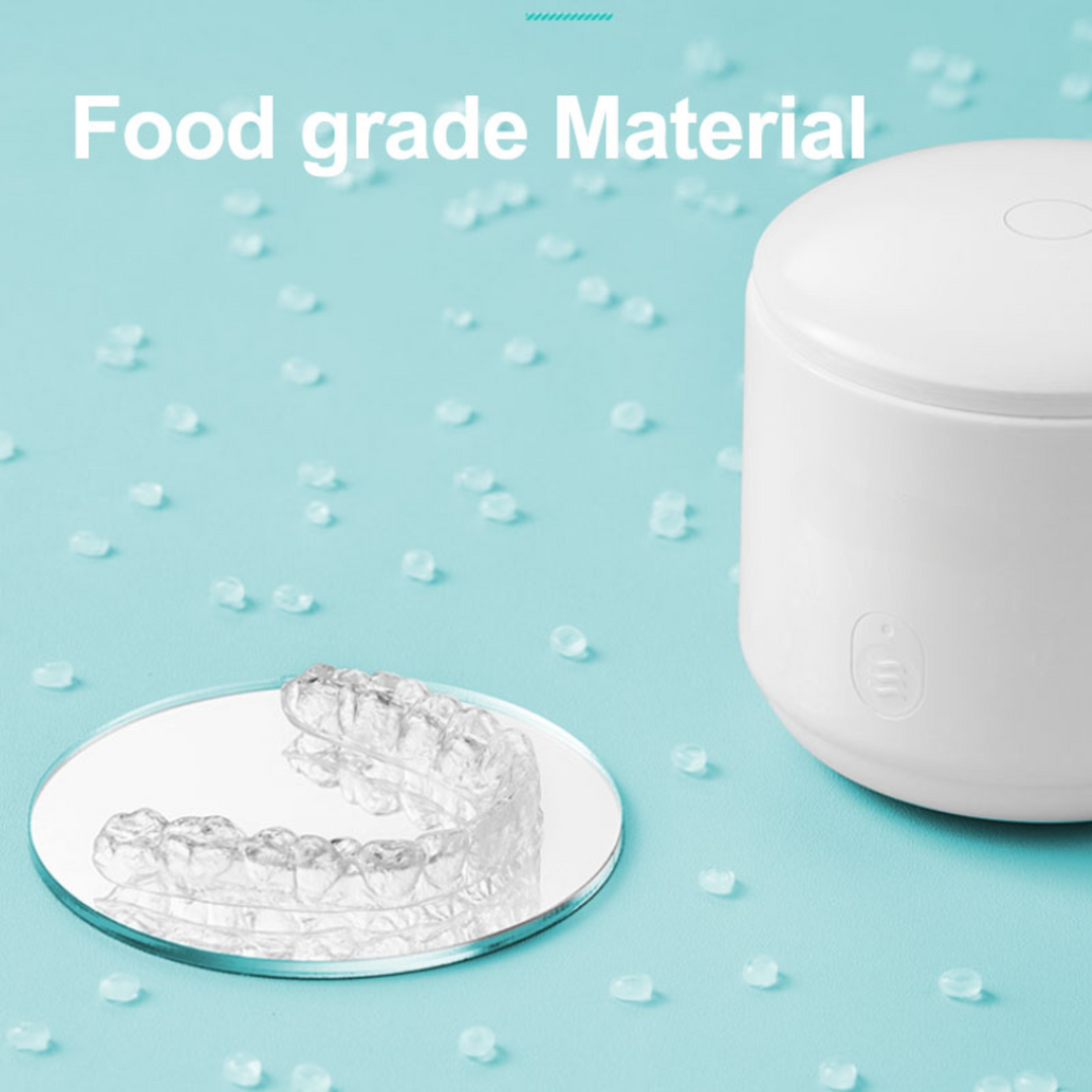 "Compact ultrasonic cleaner with UV lights, ideal for jewelry and watches, featuring a sleek design and deep cleaning technol