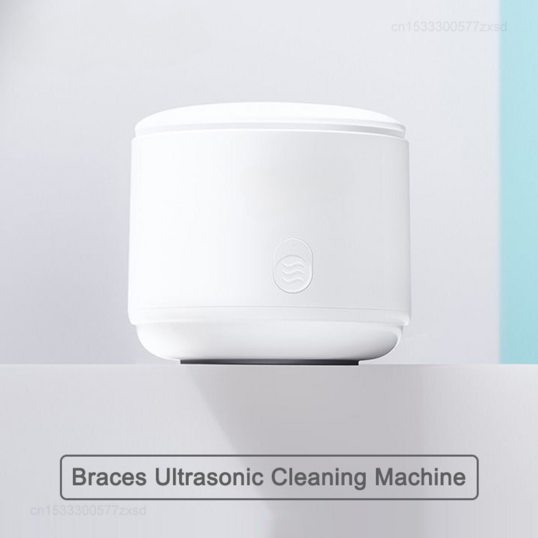 "Compact ultrasonic cleaner with UV lights, ideal for jewelry and watches, featuring a sleek design and deep cleaning technol