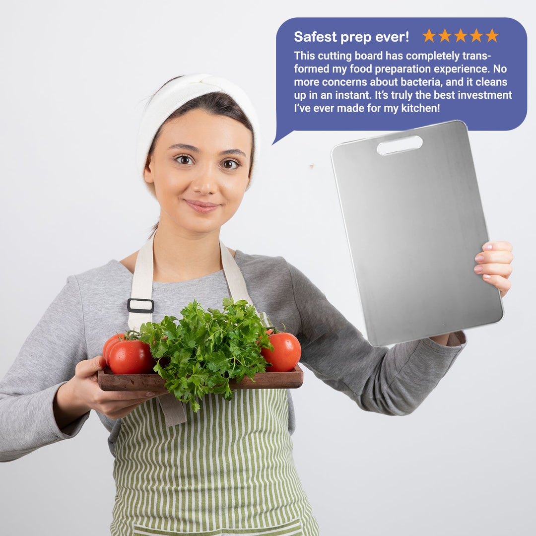 "Durable, bacteria-resistant stainless steel cutting board on countertop, non-porous surface perfect for hygienic food prep."