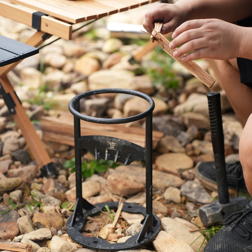 Durable manual log splitter with a sturdy steel blade, black cast iron design for easy and safe wood cutting.
