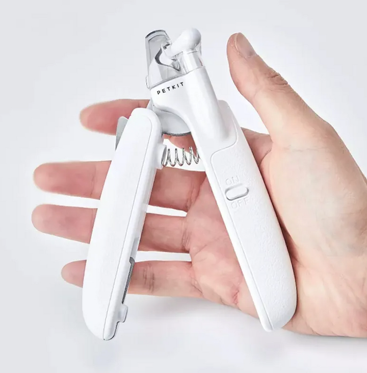 "Electronic claw trimmer for pets with ergonomic handle, designed for precise and gentle claw grooming for dogs and cats."