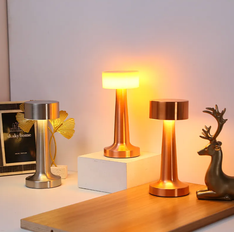 "Elegant cordless dimmable LED table lamp with touch control, ideal for living rooms and bedrooms in gold, rose gold, or silv