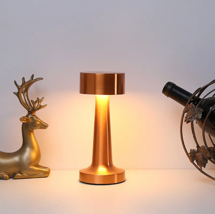 "Elegant cordless dimmable LED table lamp with touch control, ideal for living rooms and bedrooms in gold, rose gold, or silv