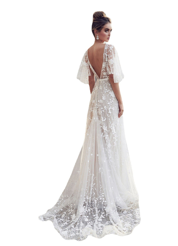 "Elegant floral maxi dress, flowing silhouette with romantic prints, perfect for summer events. Women's dresses collection."