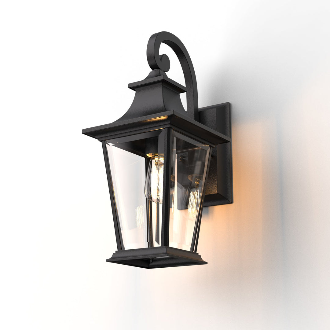 Elegant matte black outdoor wall light with glass shade, weatherproof; perfect for enhancing entrance ambiance and style.