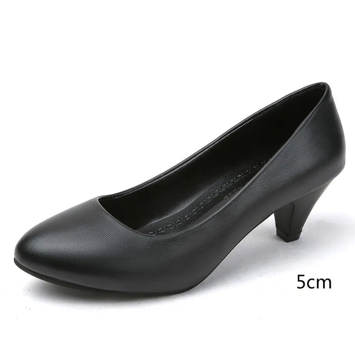 "Elegant orthopedic black women's pumps, sleek design with cushioned support for style and comfort."