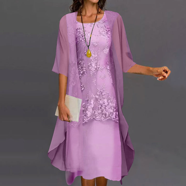 Elegant women's chiffon two-piece dress; flowing fabric, flattering fit, stylish design; front view.
