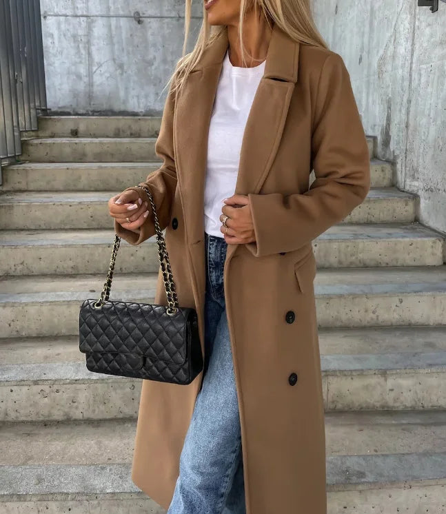"Elegant women's mid-length coat with button closure, ideal for cool weather and versatile for casual or dressy occasions."