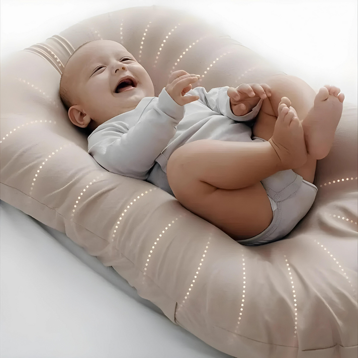 Ergonomic Breathable Baby Pillow in pink, green, and brown; hypoallergenic, provides head support, prevents flat head.