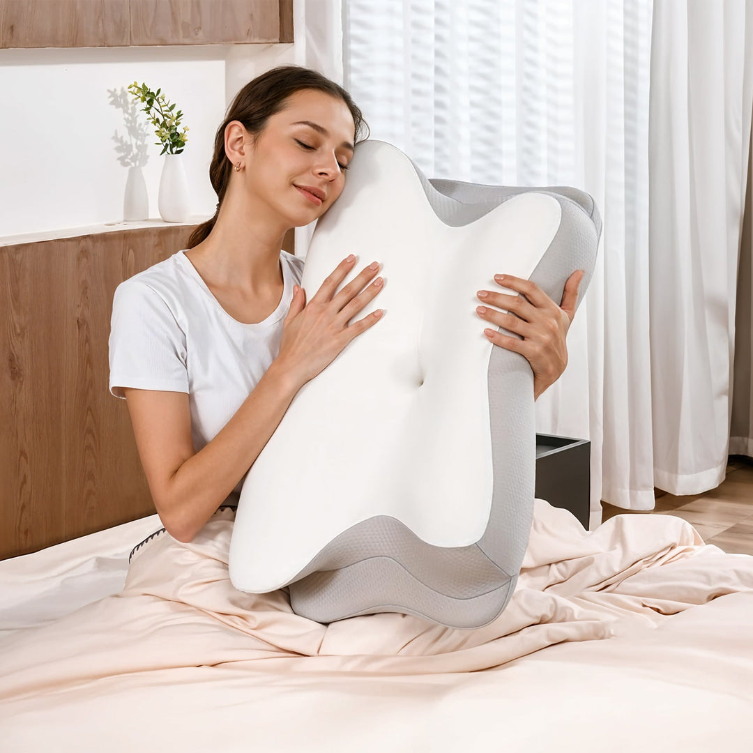 "Ergonomic butterfly-shaped memory foam pillow offering neck support, shown in stylish blue with breathable fabric design."