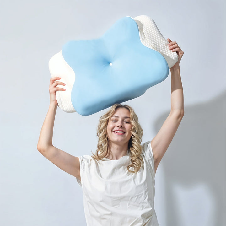 "Ergonomic butterfly-shaped memory foam pillow offering neck support, shown in stylish blue with breathable fabric design."