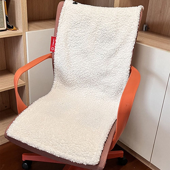 "Grey and pink flannel heated seat cushion, cozy and stylish, perfect for home, office, or travel comfort and warmth."