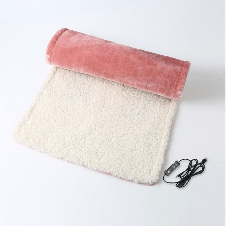 "Grey and pink flannel heated seat cushion, cozy and stylish, perfect for home, office, or travel comfort and warmth."