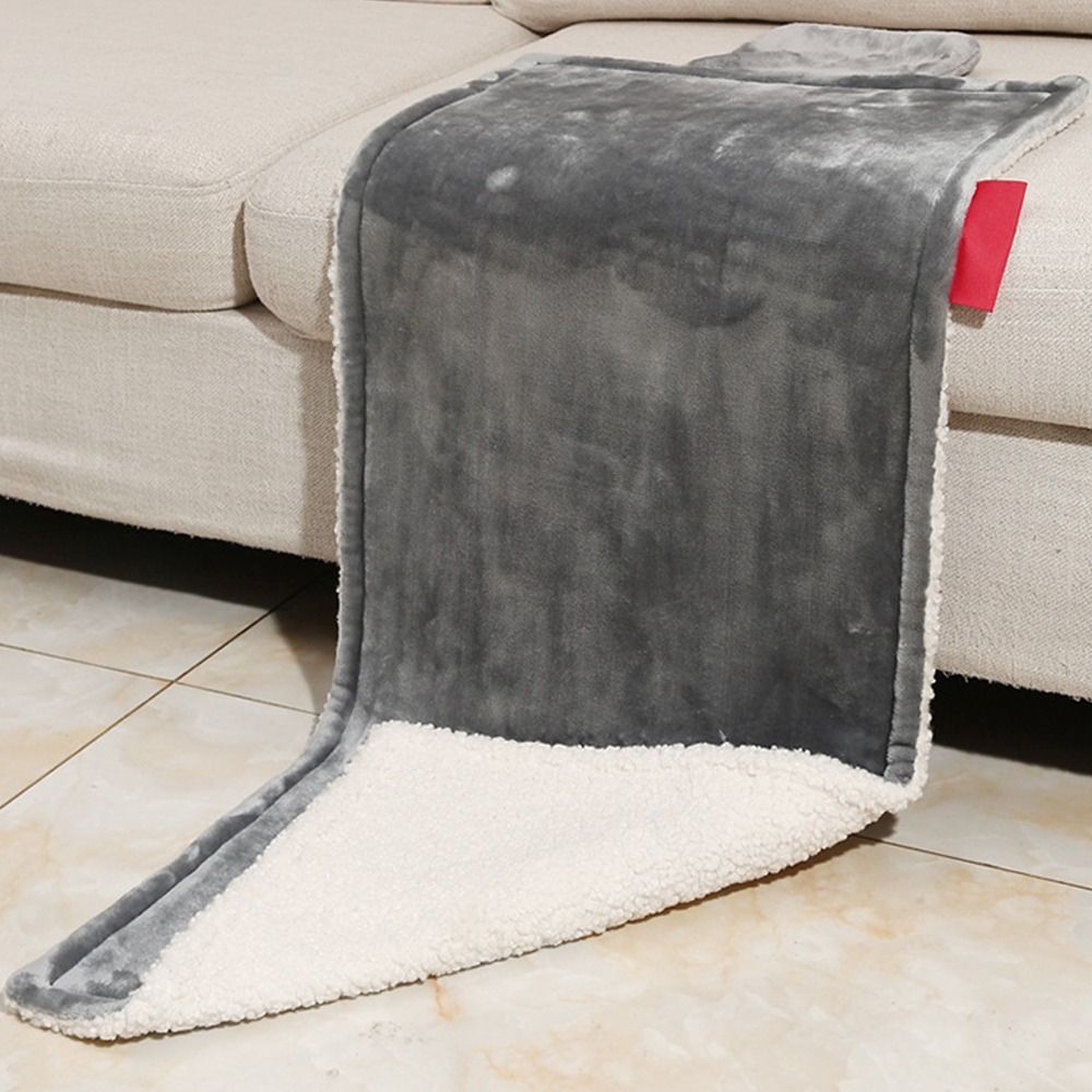 "Grey and pink flannel heated seat cushion, cozy and stylish, perfect for home, office, or travel comfort and warmth."