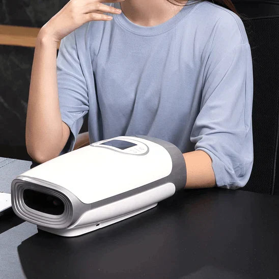 "Hand massager with heat and compression, beige, offers versatile relief with acupressure for hand wellness and relaxation."