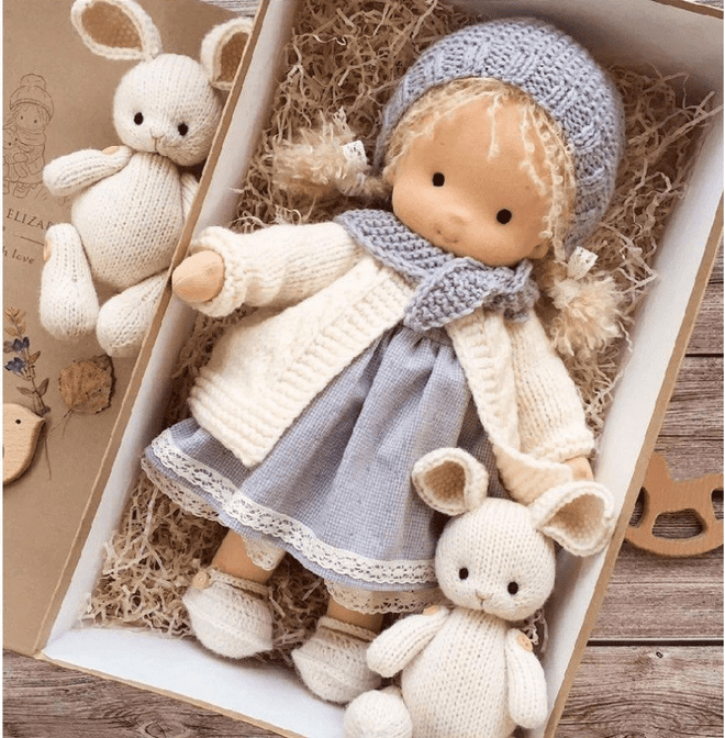 Handmade Waldorf Cuddle Doll Poppi, natural soft toy in earthy tones, crafted from hypoallergenic cotton, ideal for kids.