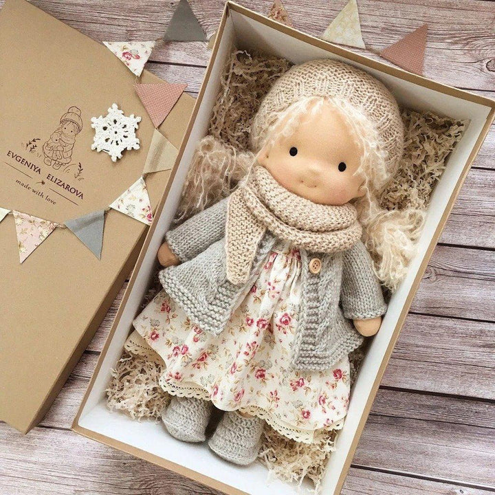 Handmade Waldorf Cuddle Doll Poppi, natural soft toy in earthy tones, crafted from hypoallergenic cotton, ideal for kids.