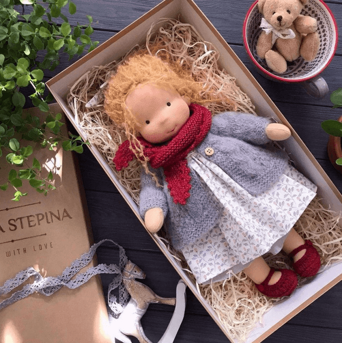 Handmade Waldorf Cuddle Doll Poppi, natural soft toy in earthy tones, crafted from hypoallergenic cotton, ideal for kids.
