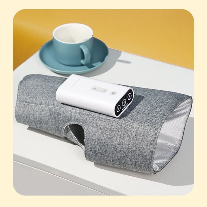 "Heated leg massager wraps around calves and ankles, shown in use. Provides soothing heat and customizable massage for relaxa