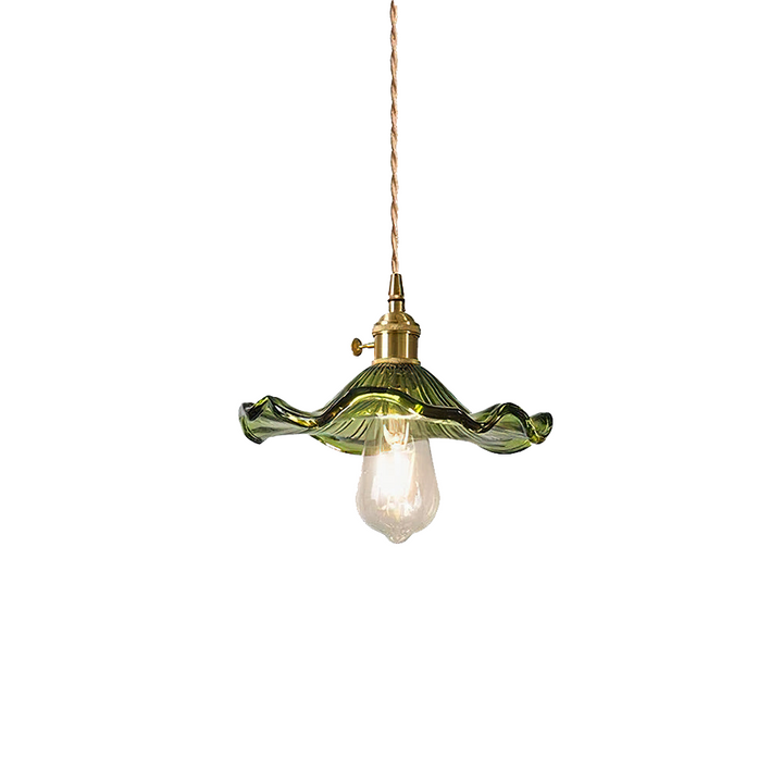"Hibiscus flower-shaped pendant light in brass and glass, adds elegance and vibrancy to stylish room decor."