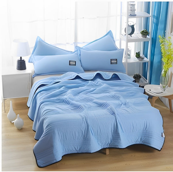 "Ice Cooling Blanket, breathable, moisture-wicking, in soothing blue, green, pink, grey colors, for comfortable sleep."
