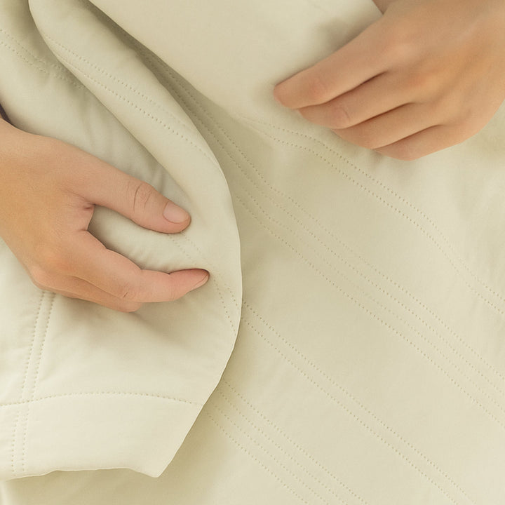 "Ice Cooling Blanket, breathable, moisture-wicking, in soothing blue, green, pink, grey colors, for comfortable sleep."