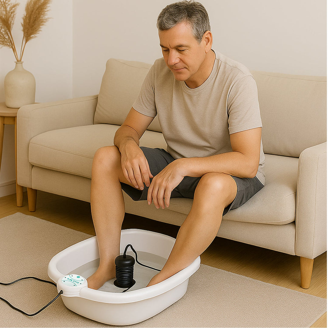 "Ionic Foot Spa for Relaxation & Detox, white plastic tub with water, offers detoxification and tranquility at home."