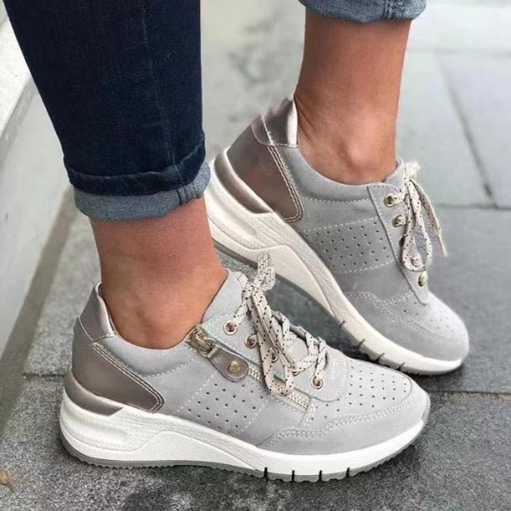 "Isabella women's orthopaedic walking shoes with ergonomic design, seen in gray, offer arch support and cushioning comfort."