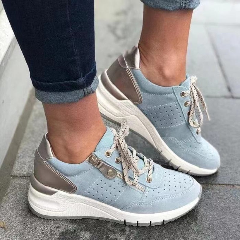 "Isabella women's orthopaedic walking shoes with ergonomic design, seen in gray, offer arch support and cushioning comfort."