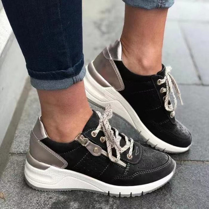 "Isabella women's orthopaedic walking shoes with ergonomic design, seen in gray, offer arch support and cushioning comfort."