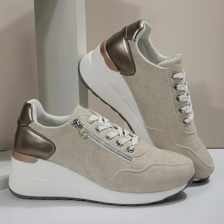 "Isabella women's orthopaedic walking shoes with ergonomic design, seen in gray, offer arch support and cushioning comfort."
