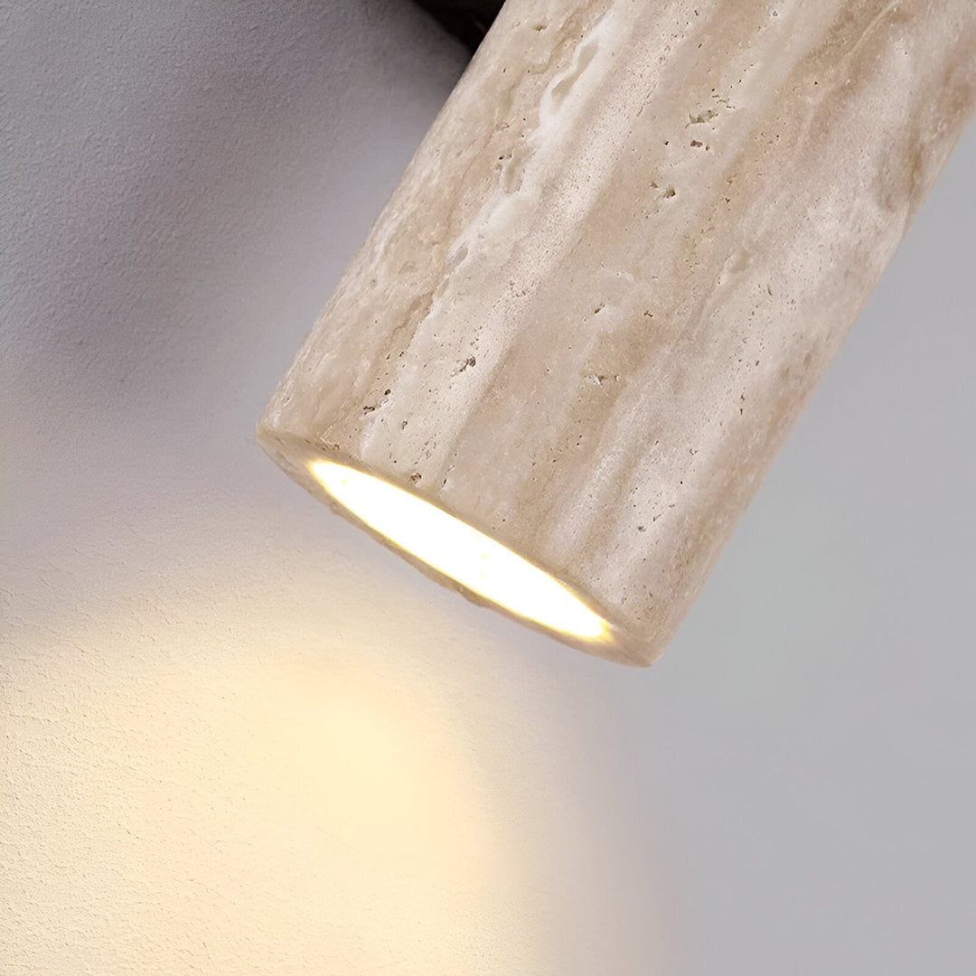 Japandi minimalist travertine stone wall lamp with natural beige finish, conveys elegance with its sleek design and warm glow