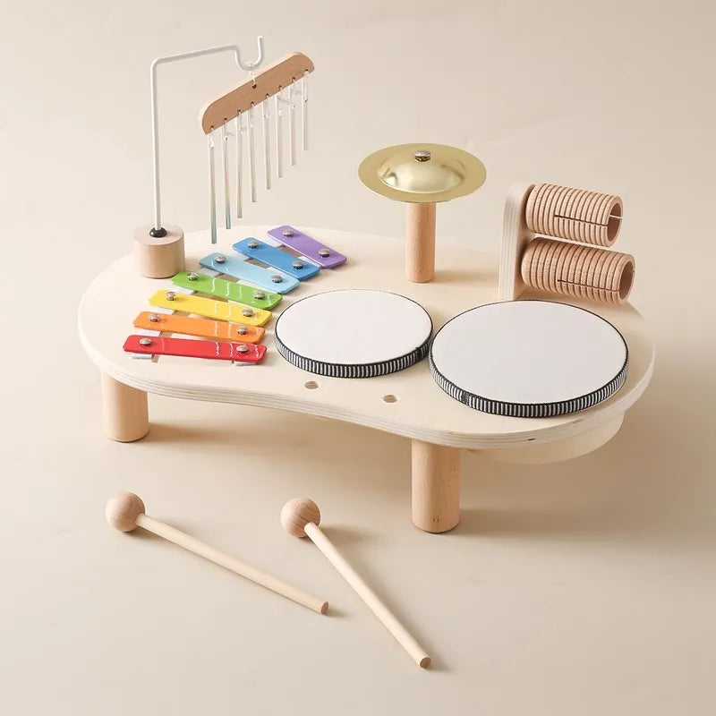 Kids wooden musical toy set with colorful xylophone, drums, and bells encourages creativity and exploration of rhythms.