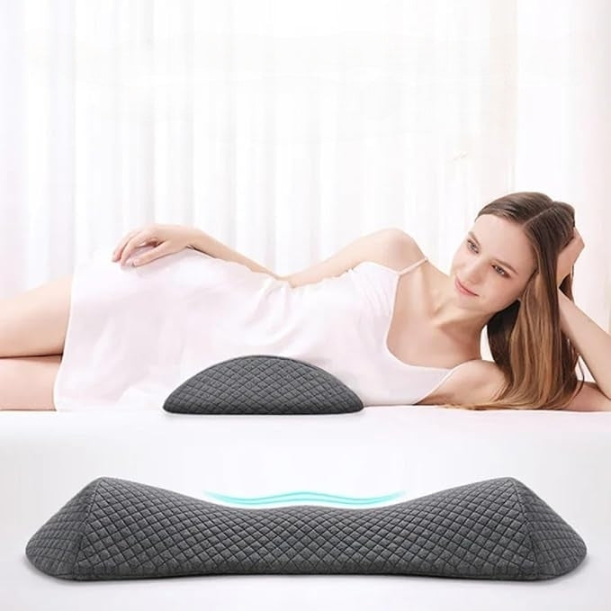 Lumbar support pillow with ergonomic memory foam contours, offering back pain relief and enhanced sleep quality in a sleek de