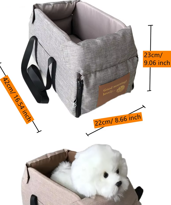 "Luxe padded dog car seat with safety belt, portable for travel, ensuring comfort and security during car journeys."