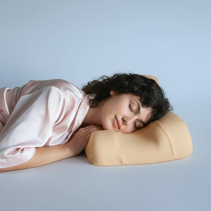 Luxurious beauty pillow with silky surface, designed for comfort and reducing sleep wrinkles, enhancing radiant skin.