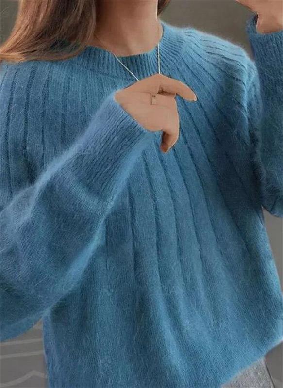 "Luxurious men's cashmere sweater perfect for fall and winter, shown in elegant blue with a plush, soft texture."