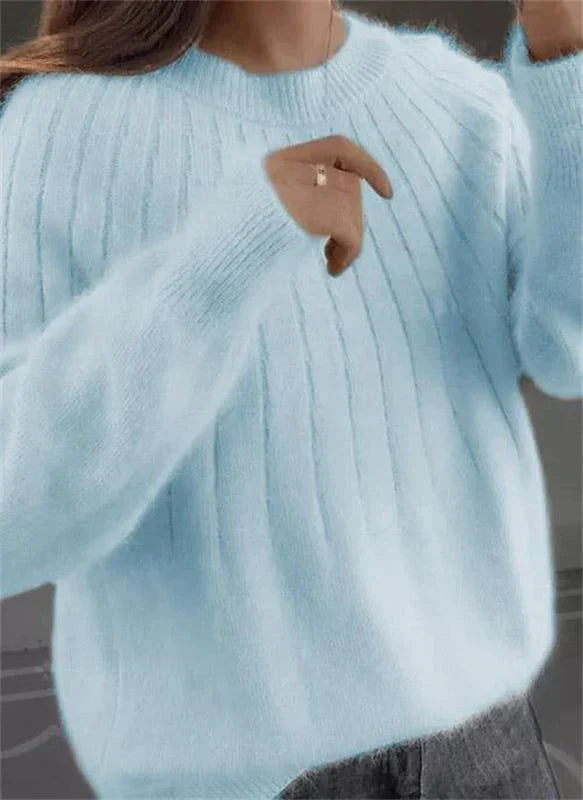 "Luxurious men's cashmere sweater perfect for fall and winter, shown in elegant blue with a plush, soft texture."