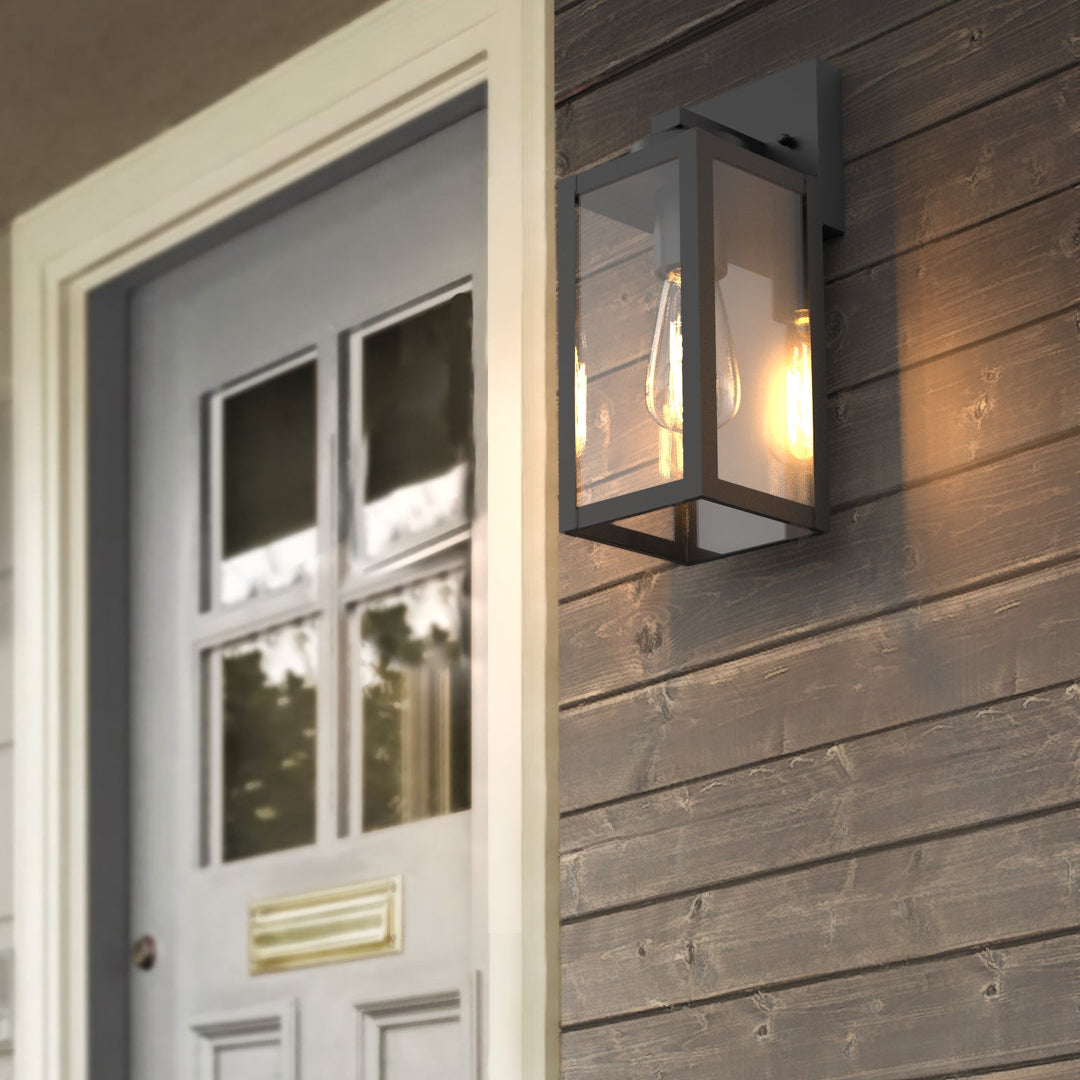 "Matte black outdoor wall light with motion sensor, IP44 weatherproof, sleek modern design, 2-pack for home security."