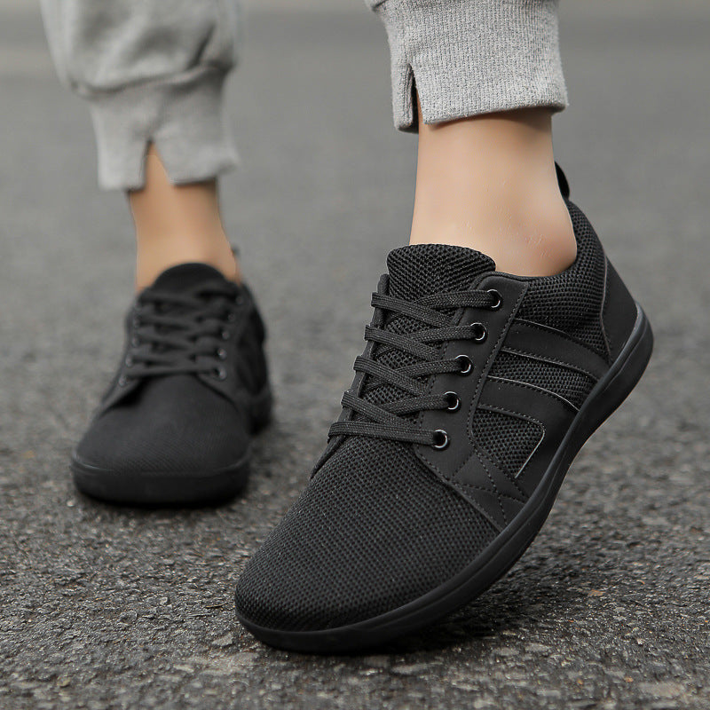 "Men's barefoot shoes, wide toe box, flexible knit upper; breathable, lightweight comfort, ideal for natural walking."