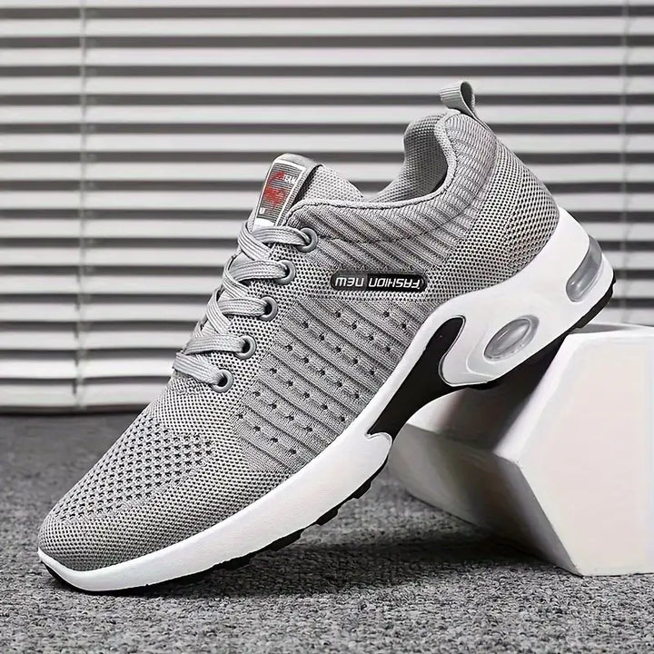 "Men's breathable running shoes with ventilated mesh, superior grip, and a high-traction sole for optimal performance."