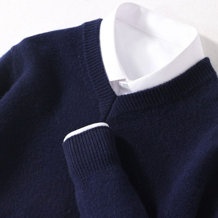 "Men's soft Merino V-Neck sweater, sleek modern design, ultra-comfortable fit, essential for style-conscious wardrobes."