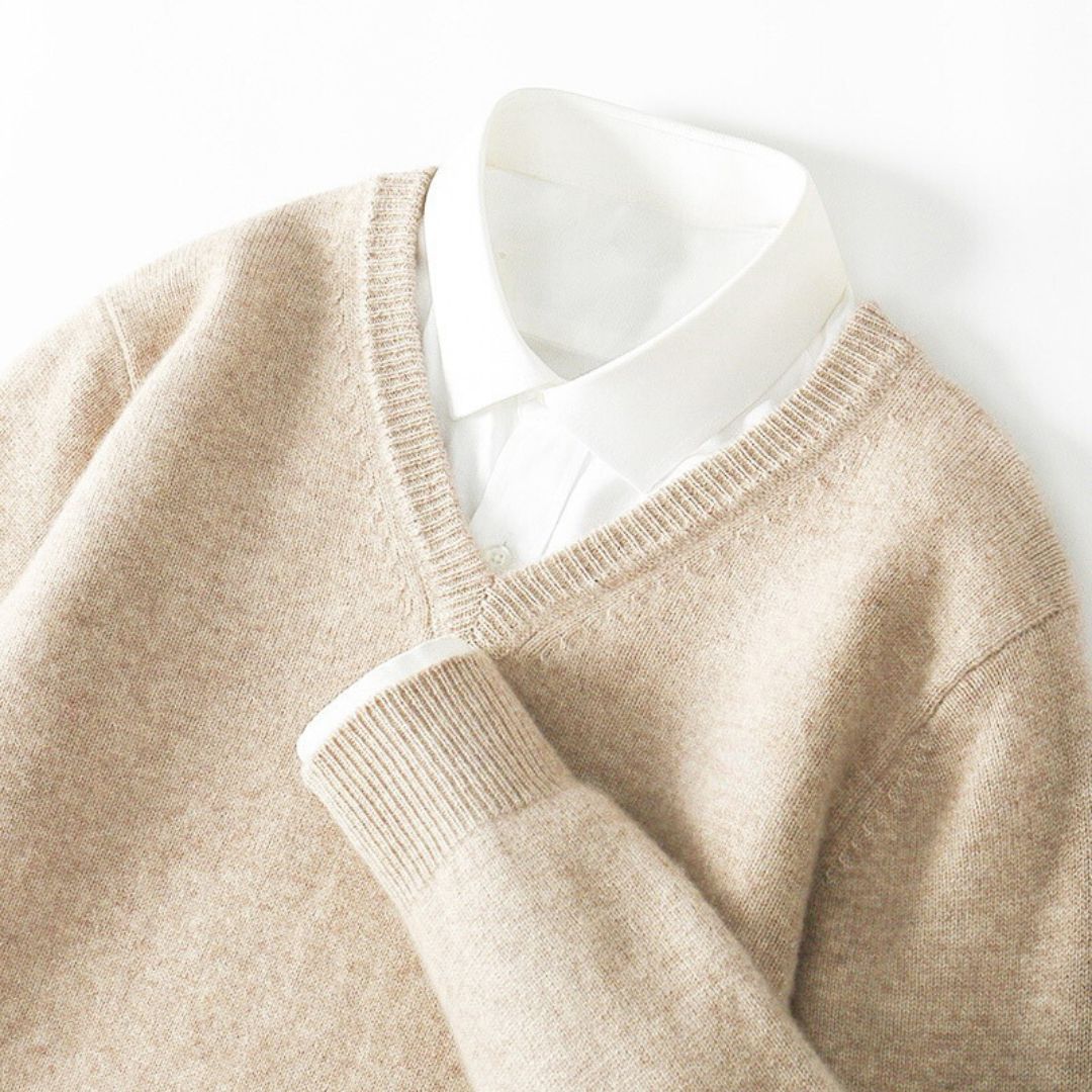 "Men's soft Merino V-Neck sweater, sleek modern design, ultra-comfortable fit, essential for style-conscious wardrobes."