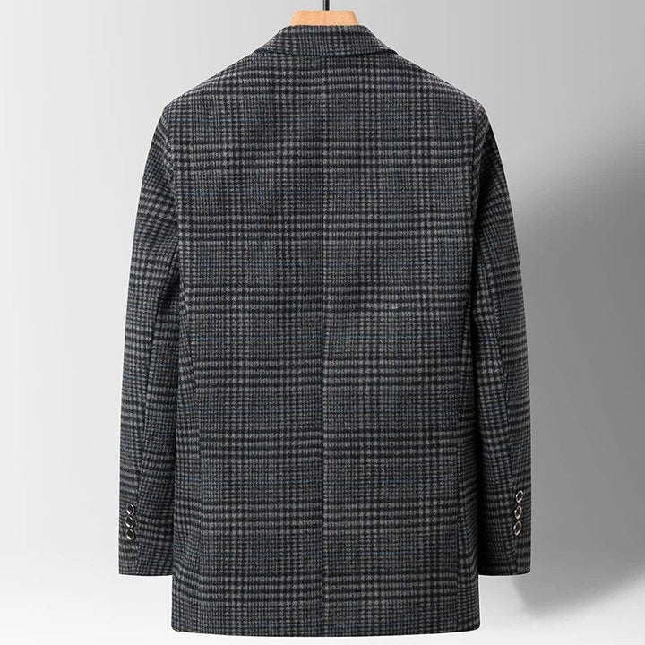 Men's tailored wool blazer with smooth cotton lining, showing elegant fit and dual pockets for stylish comfort.