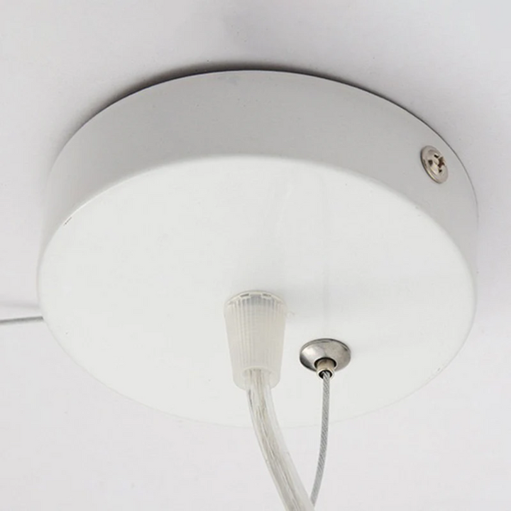 "Modern LED pendant light with cloud-like design, made of PVC and cotton, ideal for interiors. Nimbus style for cozy ambiance