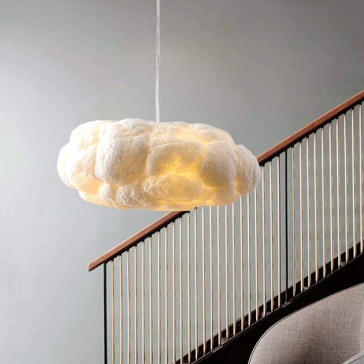 "Modern LED pendant light with cloud-like design, made of PVC and cotton, ideal for interiors. Nimbus style for cozy ambiance
