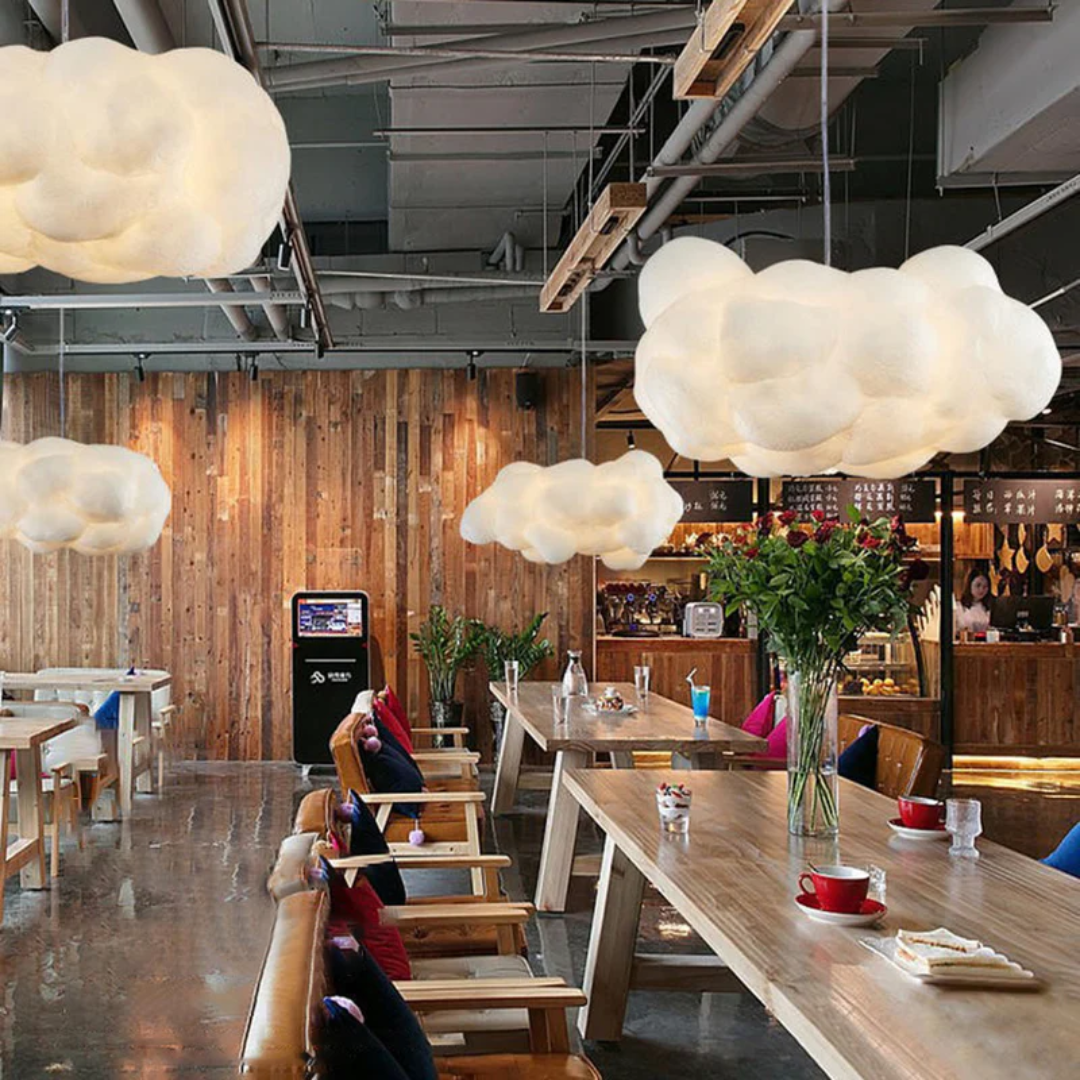 "Modern LED pendant light with cloud-like design, made of PVC and cotton, ideal for interiors. Nimbus style for cozy ambiance