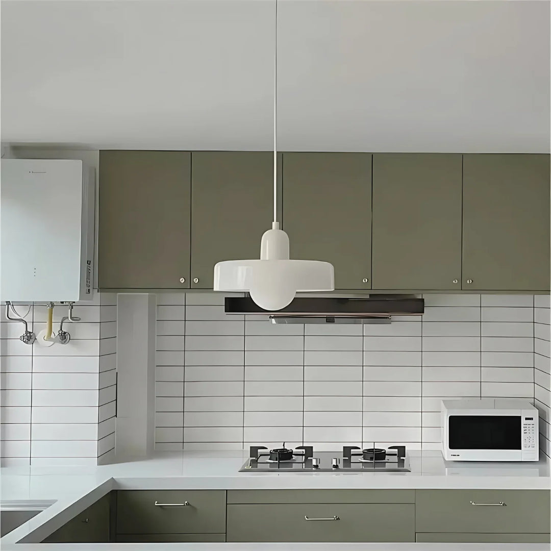 "Modern glass pendant light with sleek glass, brushed metal, ideal for elegant interiors, adds sophistication and warmth."